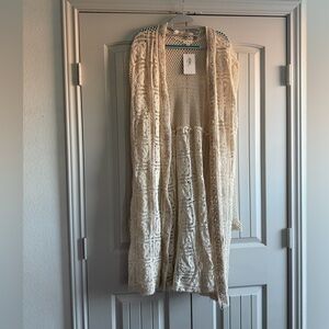 POL Boho Lace duster with Embroidered Trim
Intricate details.